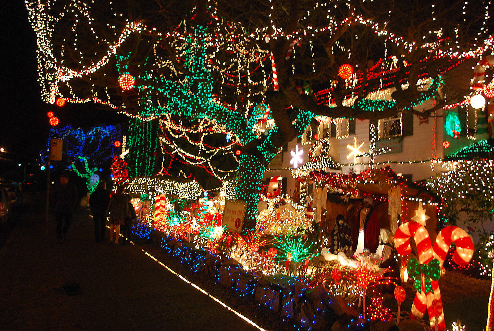 If you can spread half as much spirit as the Menashe house in West Seattle (5605 Beach Dr. SW), it should be a winning holiday season. Photo by Joe Wolf/Flickr