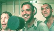 Nelson, Clooney, and Turturro sing in O Brother, Where Art Thou?