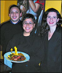 Chef Maritza Texeira with owners Fernando Ortiz (left) and Amber Berman-Ortiz (right).
