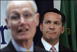 Dino Rossi (right) listens to Slade Gorton do his bidding at a GOP news conference.