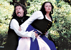 A tender moment al fresco from GreenStage's 2005 Taming of the Shrew.