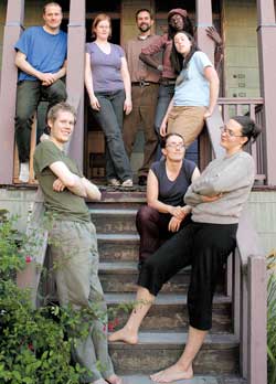 Members of the Emma Goldman Finishing School (clockwise from bottom left): Mitchell Johnson, Parke Burgess, Addy Adwell, Sheldon Cooper (founder), Darlene Johnson (friend of the commune), Thea Schnase, Jamie Lee Northern (standing), and Katie Howenstine.
