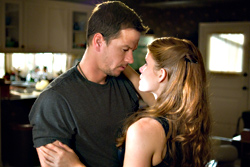 Wahlberg briefly trades his rifle for Kate Mara.