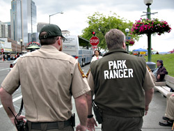 Urban rangers Brock Milliern (left) and Corby Christensen patrol Victor Steinbrueck park.