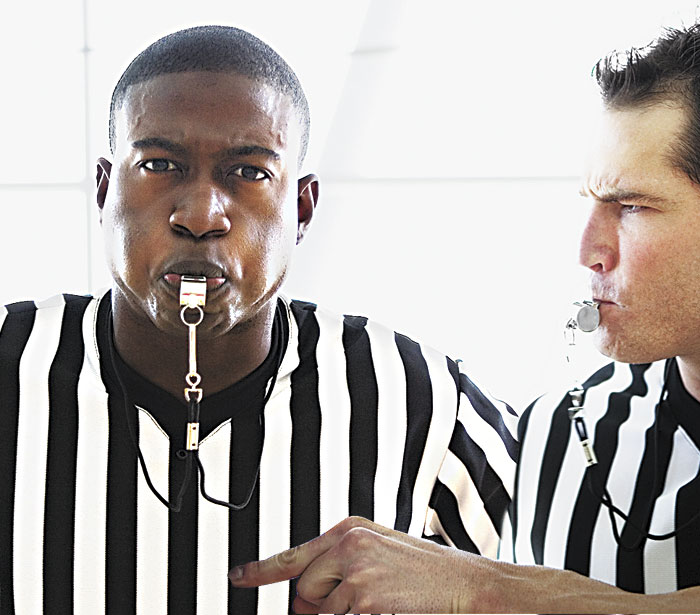 In the GNAC, black refs have blown the whistle on their supervisors.