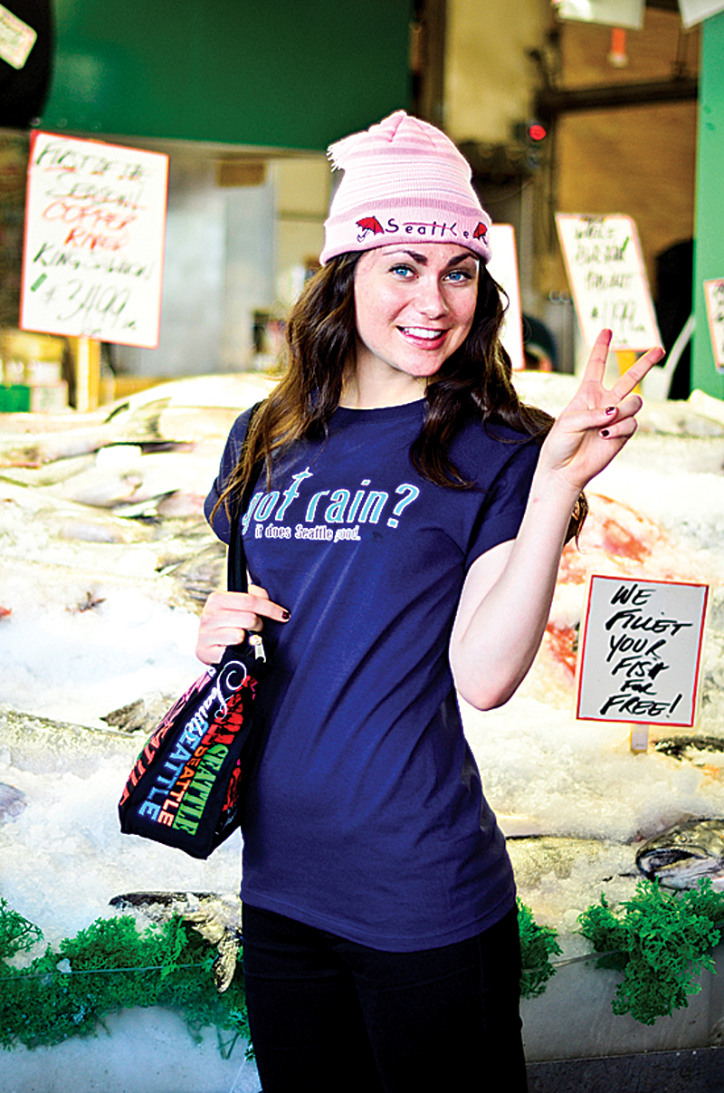 How not to do it. Pink beanie: Pike Place Gifts, $6.99Got Rain? T-shirt: Pike Place Gifts, $9.99Tote bag: Market Wear, $12.99