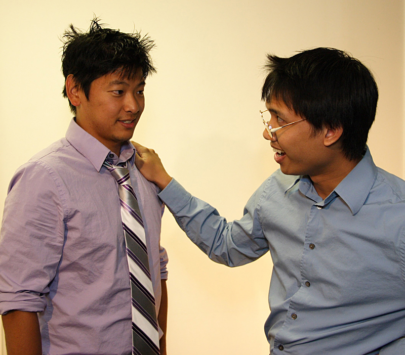 The playwright (Yim, left) and his disapproving dad (Henry Vu).