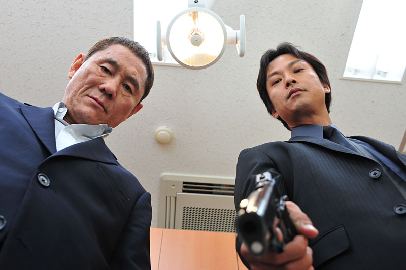 Kitano (left, with Kippei Shiina) continues to explore yakuza formalism.