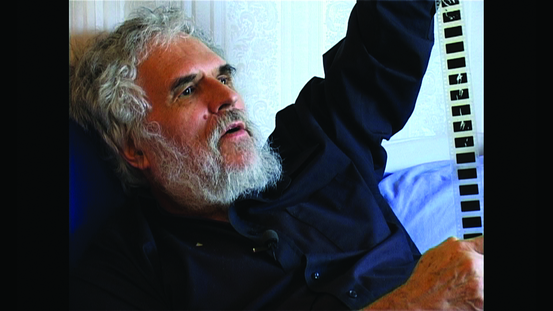 Brakhage, not long before his death, and his beloved medium.