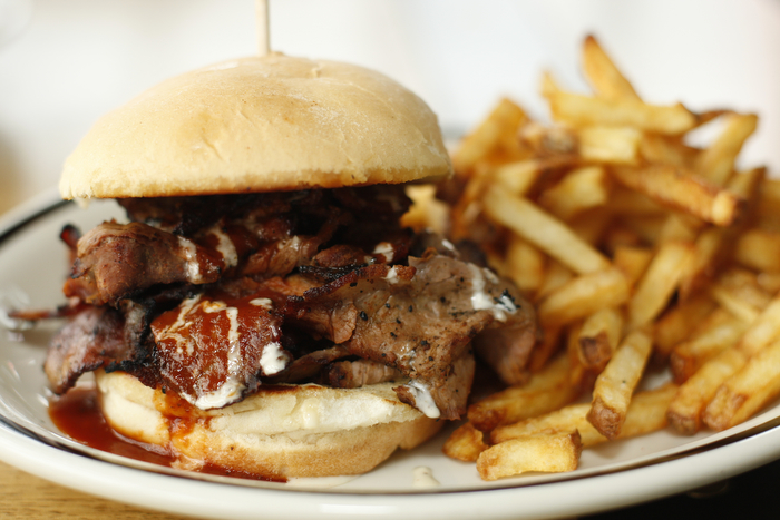 SEATTLE WA SUNDAY OCT 15, 2012 Kickin' Boot in Ballard offers an assortment of barbecue inspired dishes in the dark restaurant with large TVs and a pyramid of various bottled liquors. Photo by Kevin P. Casey/Seattle Weekly