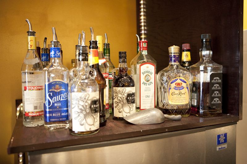 The tidy kitchen, which occupies more than half of the restaurant's indoor space (there's a patio out back), is arranged for home cooking on an expanded scale. It looks something like the small appliance section of a Goodwill. In addition to the various slow cookers and other contraptions, there are three white refrigerators, no larger than what an average apartment might require. It's an area that doubles as the back bar, which amounts to Jack Daniels, Sauza, Stoli, and a few more bottles in limited rotation.