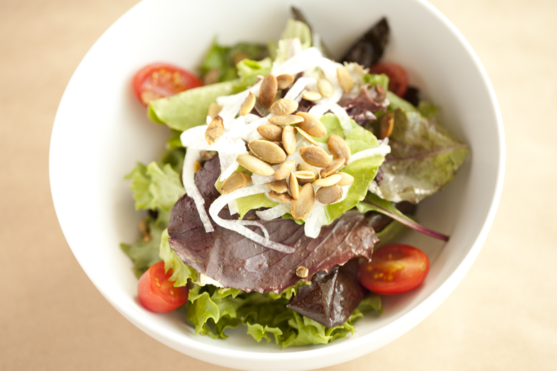 A basic spring salad, which elsewhere would be a tousled jumble of strawberries and greens, is arranged so the berry segments form a rough eight-pointed star around spritely baby spinach leaves, touched with just the right amount of dark cherry vinaigrette and seeded withpistachios.