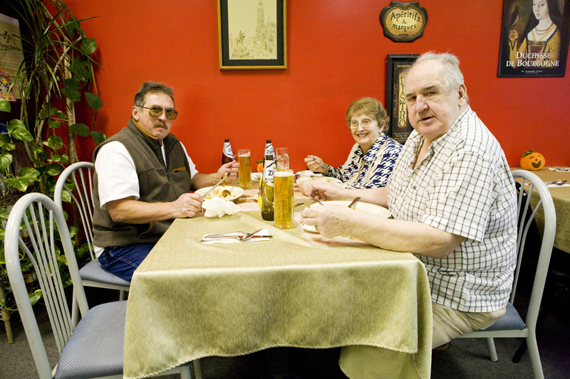 The Weinmuller family enjoying food and beers from their home country, Austria.