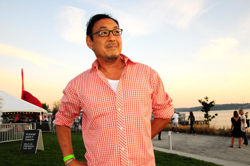 Red gingham is worn by Corey Tong