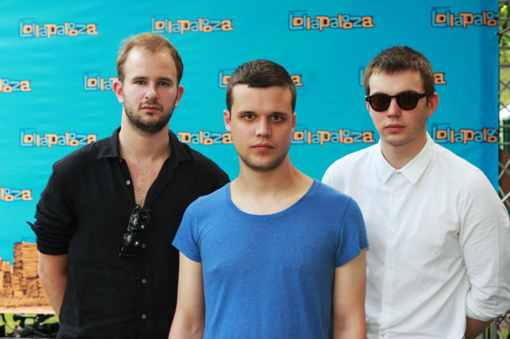 White Lies pose for a pic in the media tent.