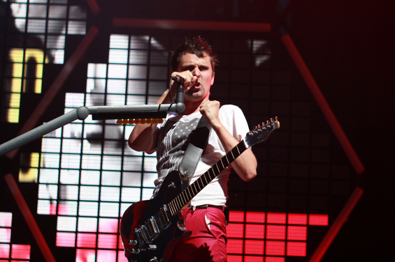 Muse plays as fireworks go off in the background.