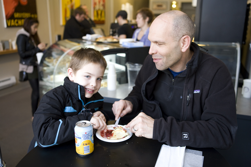 Pete Neicon shares a cherry pie with his son, Rory.