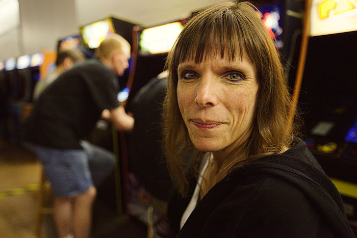 Alison hangs out while her boyfriend Bill Carlton plays Galaga.A Bill is ranked 10th in the world on Missile Command and stars in the documentary, High Score.