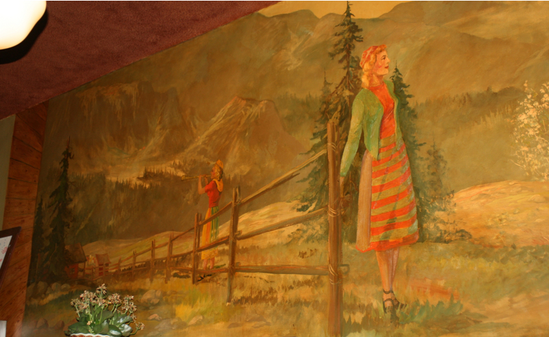 Hattie's Hat: Oldfield also painted the mural at Hattie's Hat as well as three other smaller paintings hanging in the back room back in the mid fifties when it was called The Old Home. Ninety year old Oldfield is responsible for numerous murals through-out the Northwest many of which have been lost over the years. Originally from Alfalfa, Washington, he grew up on the Yakima Indian Reservation and spent his early youth working as a cowhand before heading off to fight in WWII. He tried his hand at advertising art but found it wasn't for him. When I asked how he became an artist he told me, By being stubborn and foolish. I think real estate would have been much better but I wouldn't trade it for anything, I've had a wonderful life. He still paints everyday out of his Tacoma home.