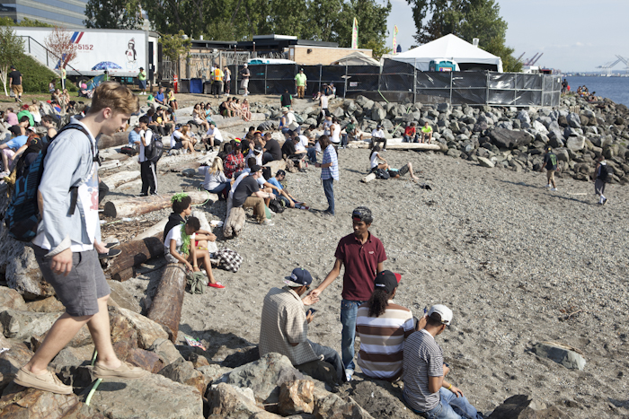 The sunny weather made the beach at Myrtle Edwards Park ideal to relax at during Hempfest. Photo by Anna Erickson