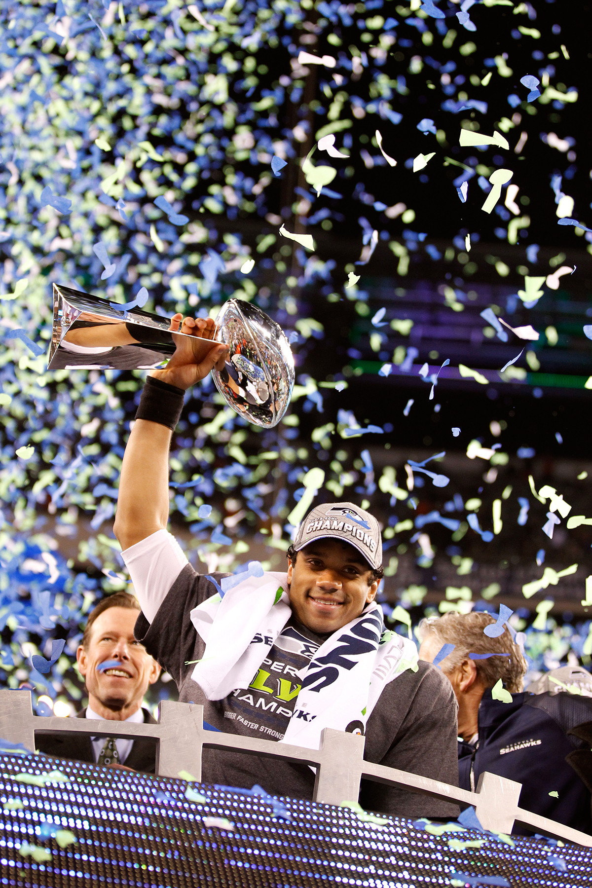Photo by Jennifer Buchanan / The Herald Seahawks quarterback Russell Wilson holds the Vince Lombardi Trophy following a 43-8 Super Bowl victory against the Broncos at MetLife Stadium.