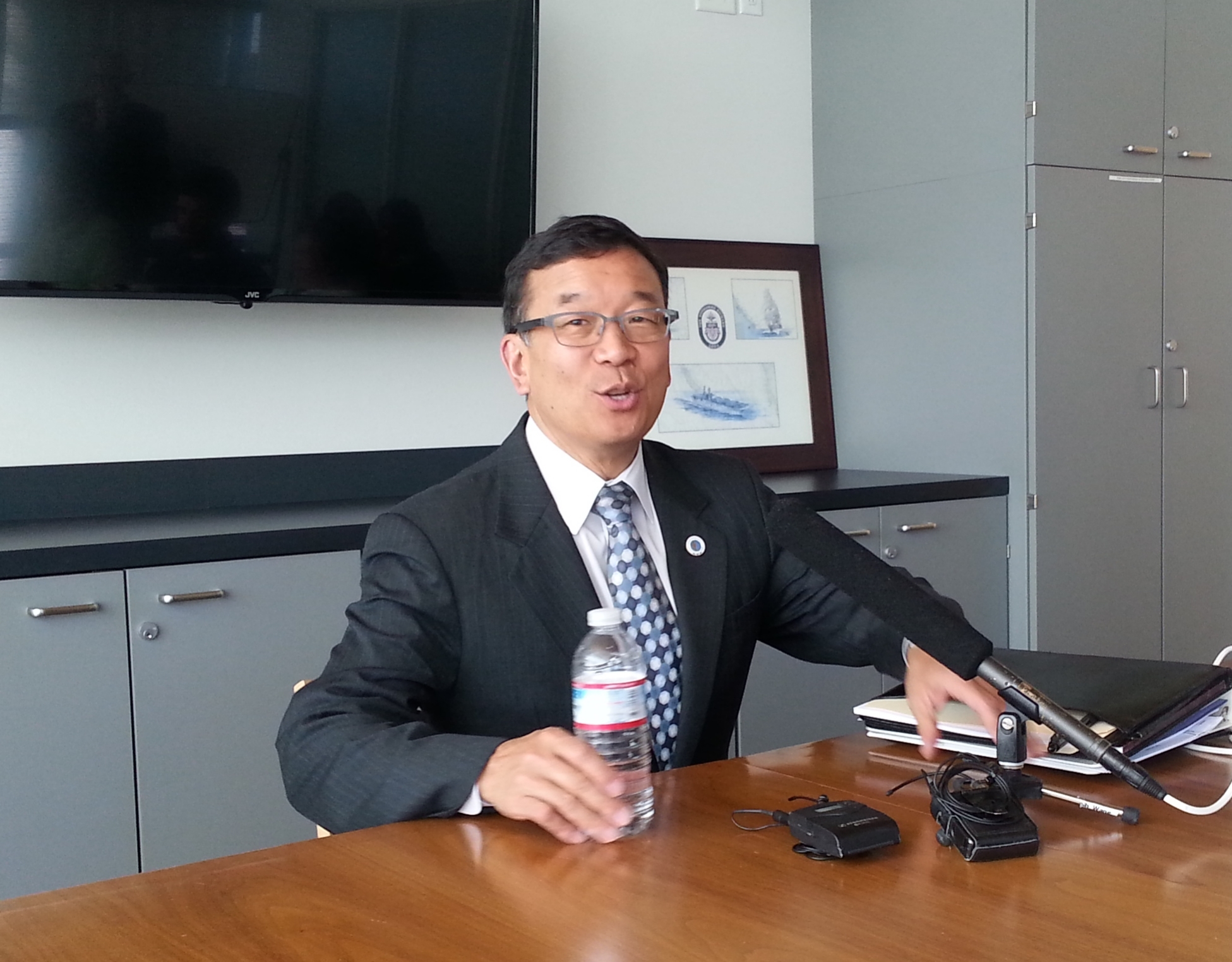 Okamoto fields questions at a press conference following the vote. Photo by Casey Jaywork