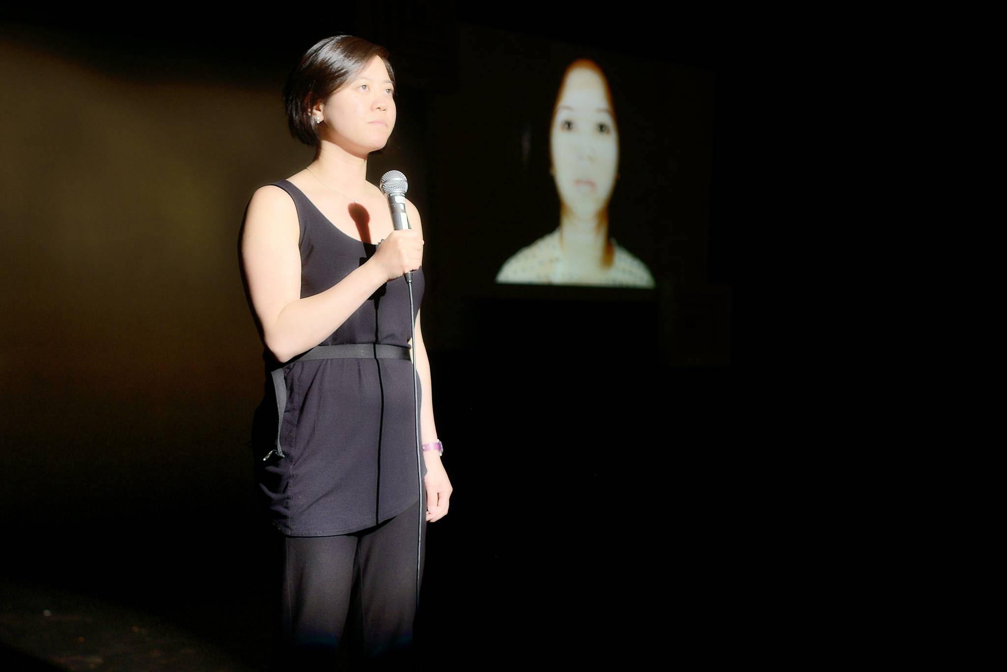 Susan Lieu performs a version of 140 LBS at Northwest New Works in 2018. Photo by Joe Iano