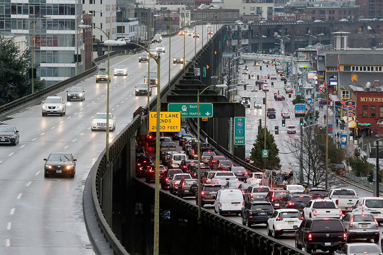Andy Bronson / The Herald                                 Southbound traffic backs up as northbound drivers cruise on with ease on the Highway 99 viaduct on Tuesday, January 8.
