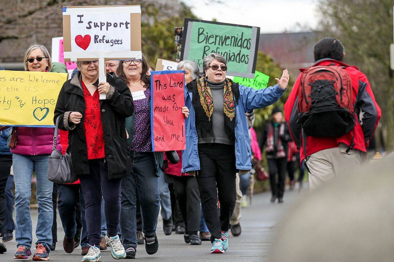 In this file photo, marchers make their way from Trinity Episcopal Church in Everett on Feb. 26, 2017. Muslim refugees’ admissions into the U.S. have declined by 85 percent since the Trump administration came into power in 2017, according to the International Rescue Committee. Sound Publishing file photo