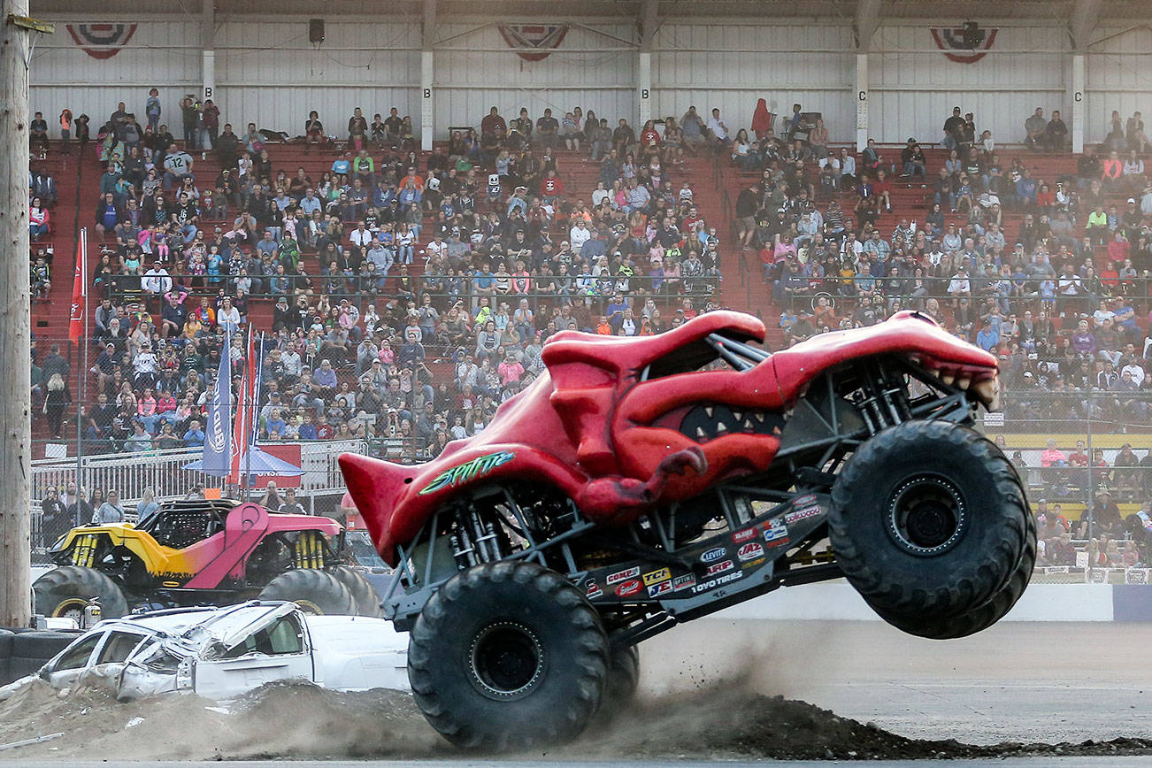 High-octane entertainment abound during the monster truck show Friday evening at the Evergreen Speedway in Monroe on August 23, 2019. (Kevin Clark / The Herald)