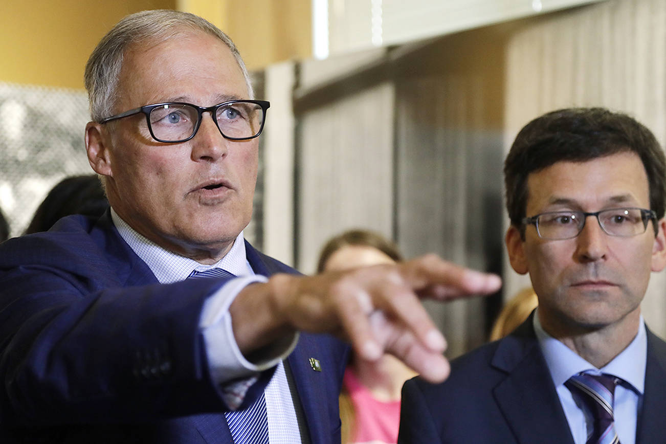 A veto too far? Lawmakers may sue Inslee to figure it out