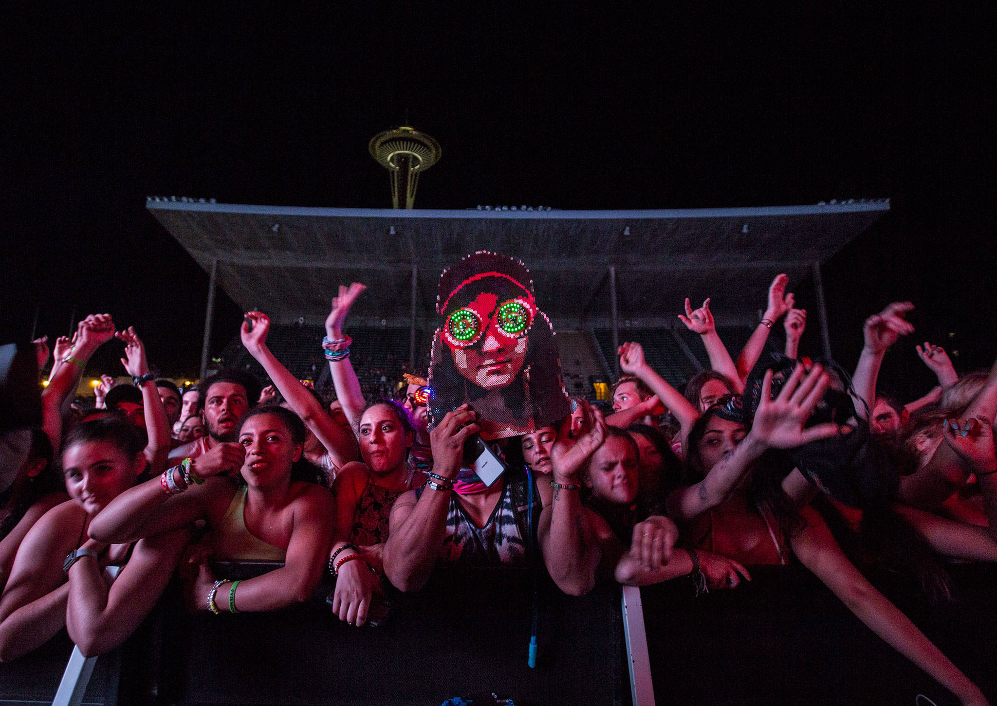A Rezz fan holds up a large perler of her face during her performance at Bumbershoot Music & Arts Festival on Sunday, Sept. 1, 2019 in Seattle, Wash. (Olivia Vanni / The Herald)