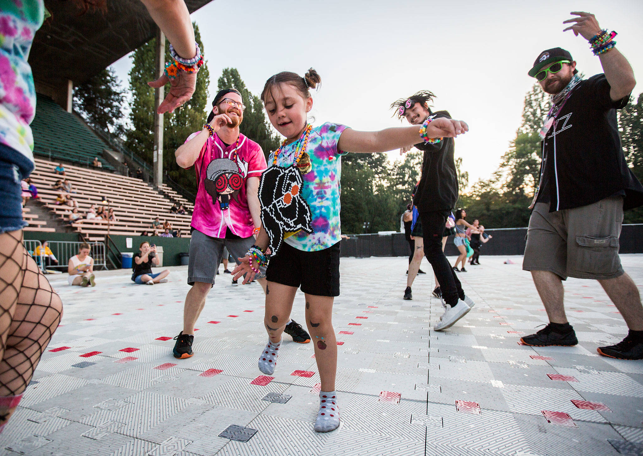 Skye Bassett, 6, dances with her family during Jai Wolf’s rescheduled performance at Bumbershoot Music & Arts Festival on Sunday, Sept. 1, 2019 in Seattle, Wash. (Olivia Vanni / The Herald)