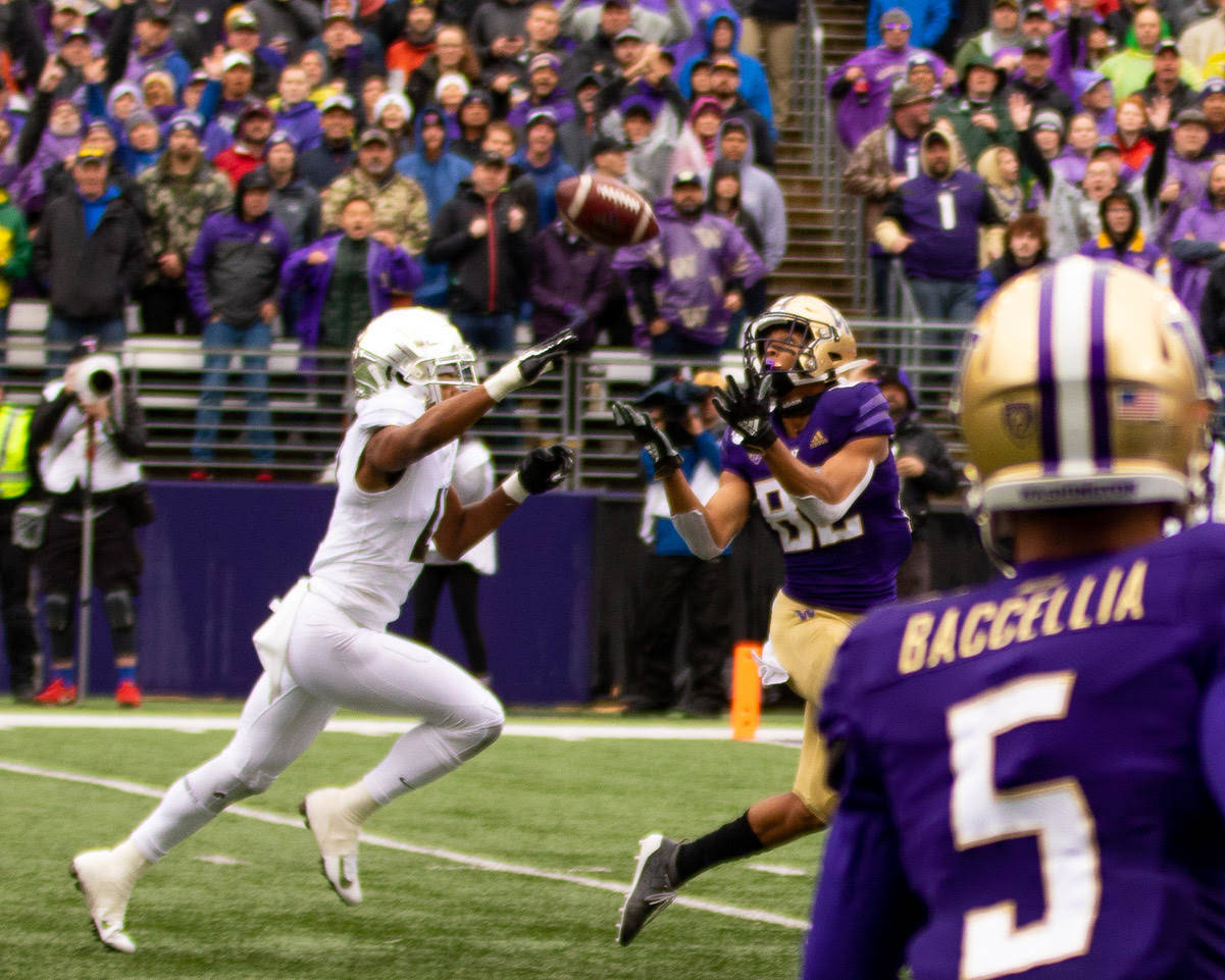 UW Junior Wide Receiver Jordan Chin catches a pass from Jacob Eason.