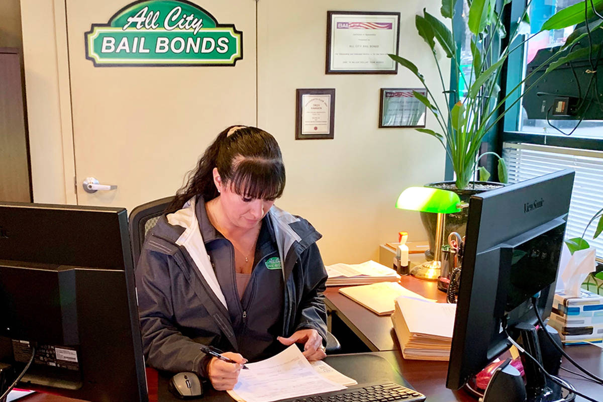 The staff at All City Bail Bonds in Seattle work with clients and their families to help individuals in the justice system move forward in their lives. Photo by Mackenzie Schwartz/Sound Publishing