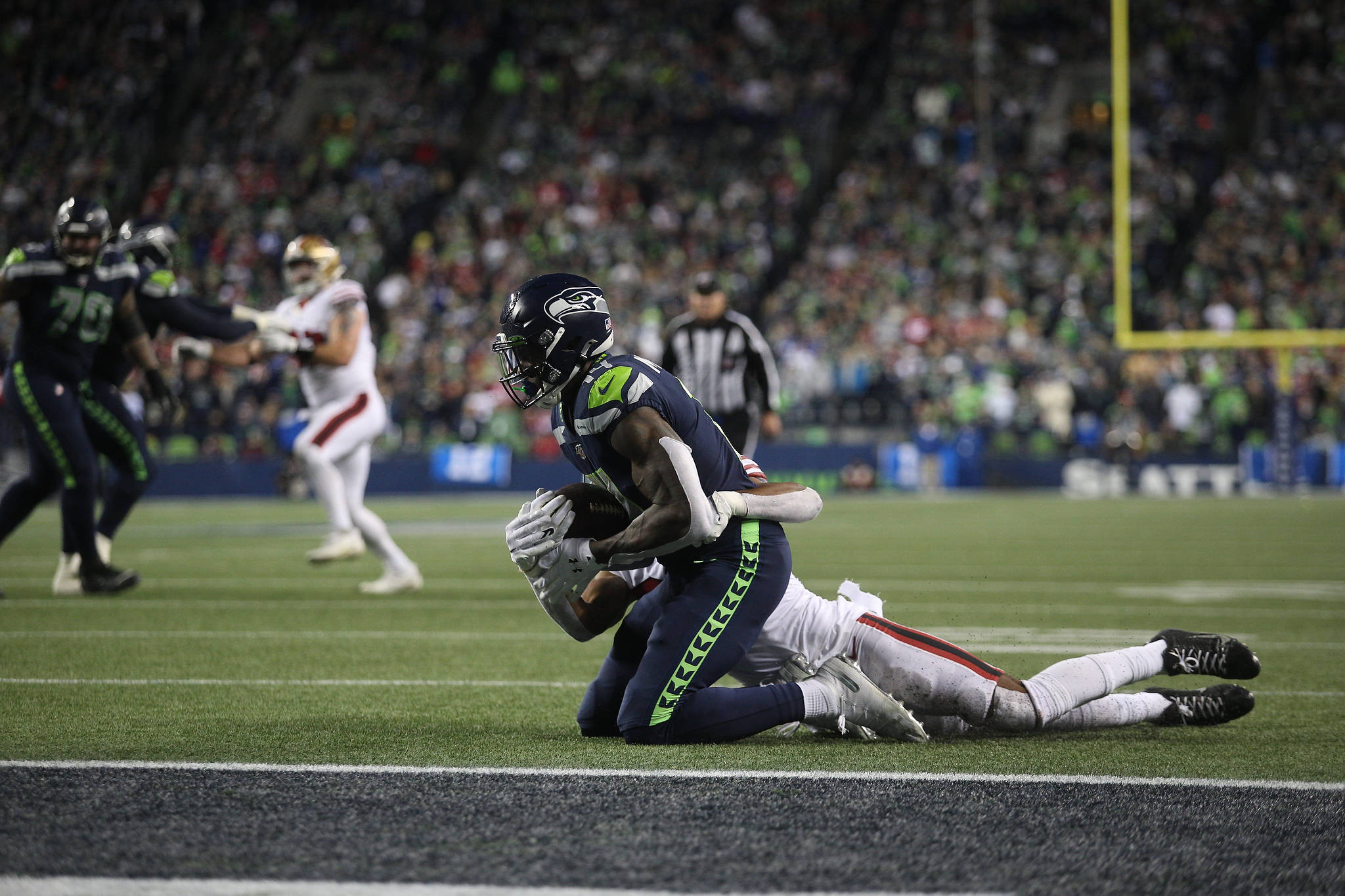 Seattle Seahawks DK Metcalf hauls in a pass just short of the end zone. The Seahawks lost to the San Francisco 49ers 26-21 at CenturyLink Field on Sunday, Dec. 29, 2019 in Seattle, Wash. (Andy Bronson / The Herald)