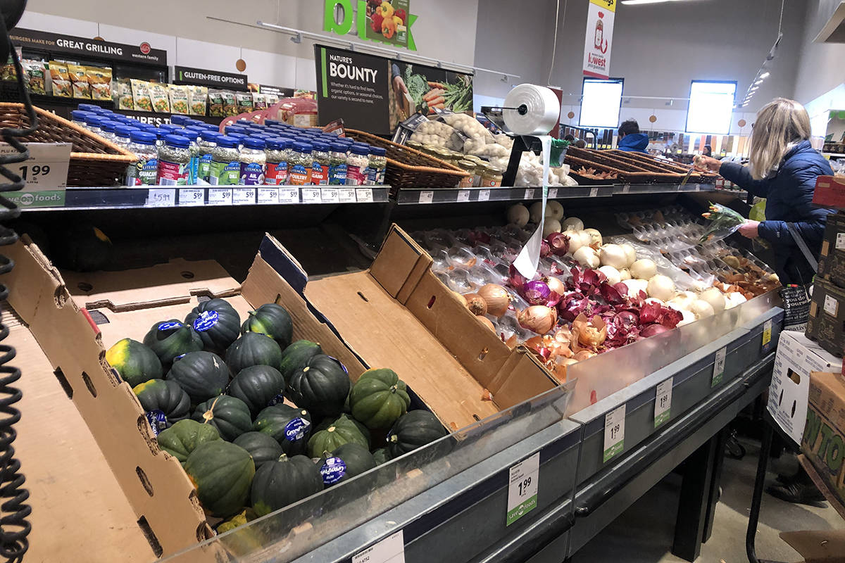 Grocery store staff are working hard to keep the shelves stocked during the COVID-19 pandemic. File photo