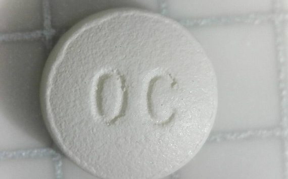 Oxycodone pill. (Photo courtesy of Wikipedia)