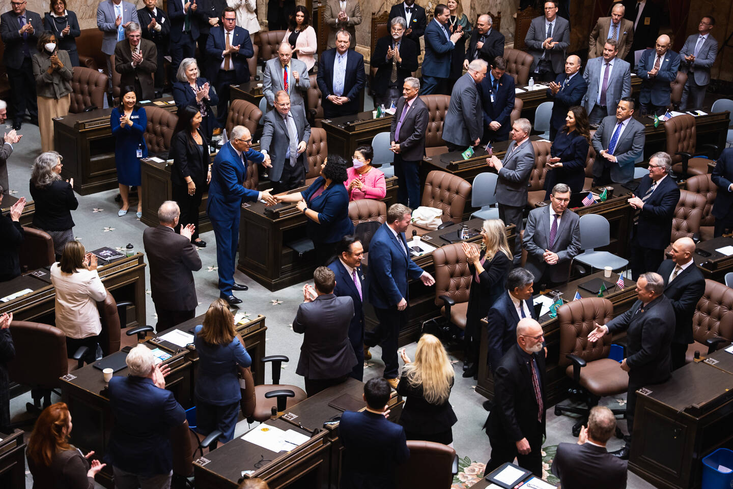 Gov. Jay Inslee enters the House chambers before beginning the 2023 State of the State. Courtesy photo