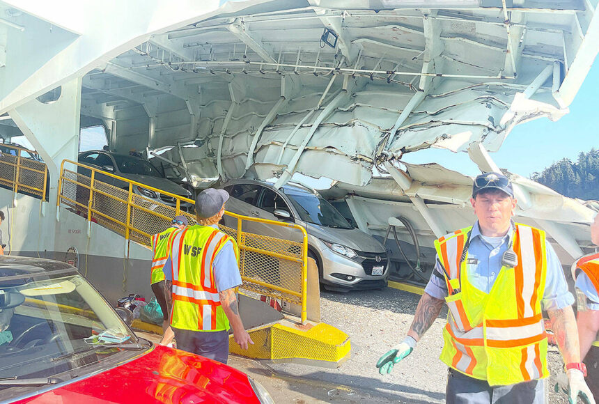 <p>In the immediate aftermath of the crash of the Cathlamet in July 2022, ferry workers and passengers surveyed the serious damage to the boat, which pinned one car in folded steel. (Photo courtesy of Pam Kirkpatrick)</p>
