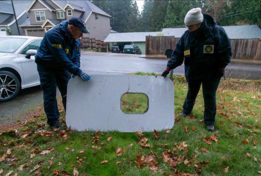 <p>The plane door that flew off of the Alaska Airlines flight 1282 Boeing 737-9 MAX found by NTSB investigators in a Portland resident&rsquo;s backyard. (Courtesy of NTSB)</p>