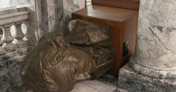 A bust of George Washington lies tipped over on the third floor of the Washington state Capitol building in Olympia, after a vandal broke in and caused damage on Sunday night. (Photo courtesy of Department of Enterprise Services)