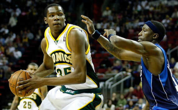 Dallas Josh Howard defends the Sonics Kevin Durant as he looks for the basket. File photo