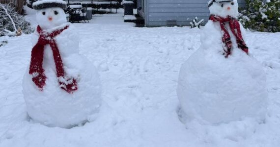 A pair of people made of snow in Snoqualmie on March 13. Photo courtesy of Kari Wahlstrom Collins