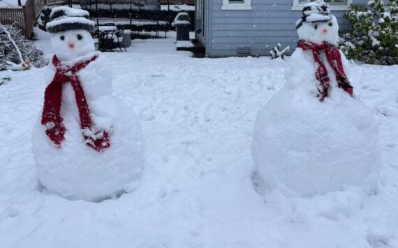 A pair of people made of snow in Snoqualmie on March 13. Photo courtesy of Kari Wahlstrom Collins