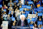 Bernie Sanders supporters cheer for the presidential candidate during a rally in Seattle on March 20, 2016.