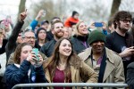 Bernie Sanders supporters welcome the presidential candidate as he speaks to throngs of supporters waiting to enter his rally in Seattle on March 20, 2016.