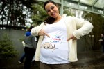 Raquel Ramirez demonstrates that she's voting for two while waiting for a Bernie Sanders rally in Seattle on March 20, 2016.