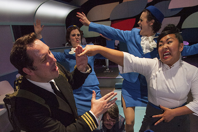 Bob Trippe and Jiang Ping in a high-fliying fight scene. Photo by Bruce Clayton Tom