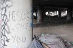 &ldquo;Jesus loves you&rdquo; graffiti from inside the Jungle. Photo by Casey Jaywork.